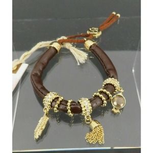 Jessica Simpson Women BOLO Bracelet Faux Leather Gold Tone Slider Charm Feather